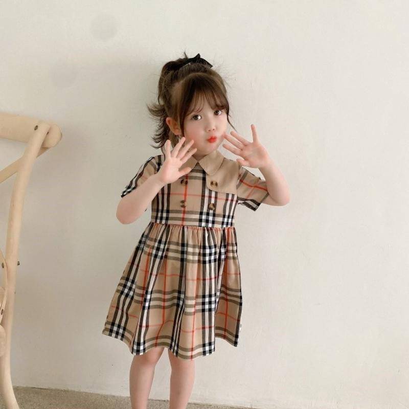 Đầm thời trang Anh Quốc hoa văn caro chất liệu cotton tay ngắn thiết kế 2 hàng nút phong cách công chúa