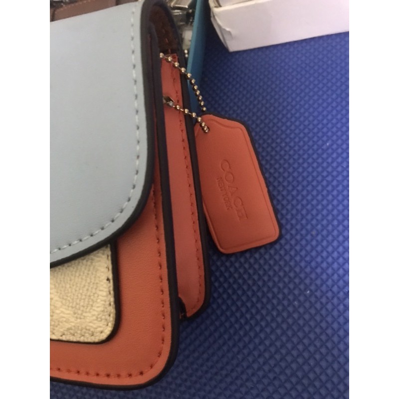 Túi coach hoa trà 16cm