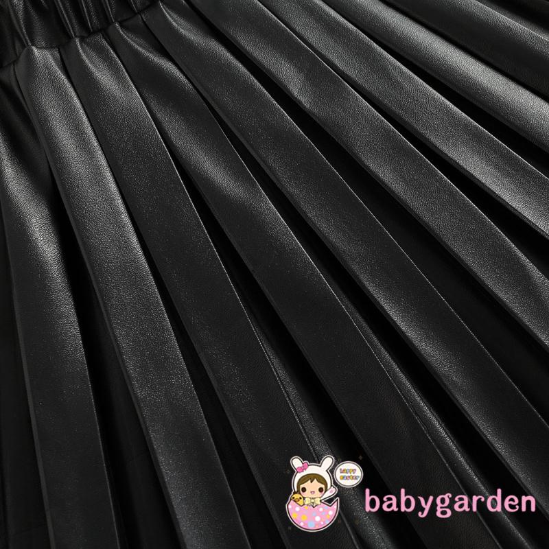 Chân váy da xếp ly lưng thun co giãn màu trơn dành cho bé gái