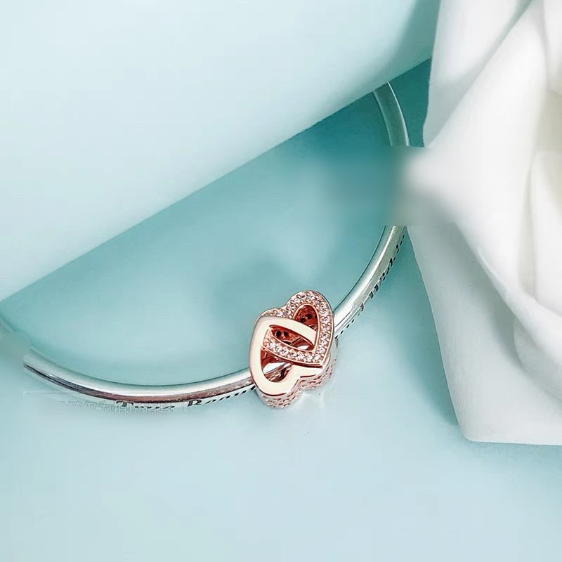 charm pan 2 trái tim vàng hồng đính đá bạc s925