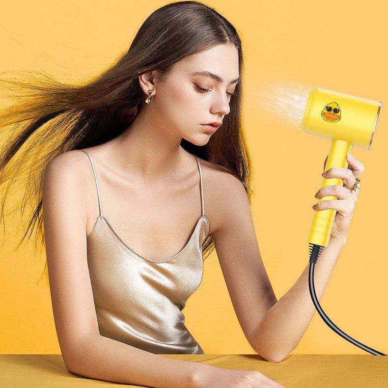Máy sấy tóc mini cầm tay hiệu vịt vàng/ Máy tạo kiểu tóc có ion âm với công suất 1200W