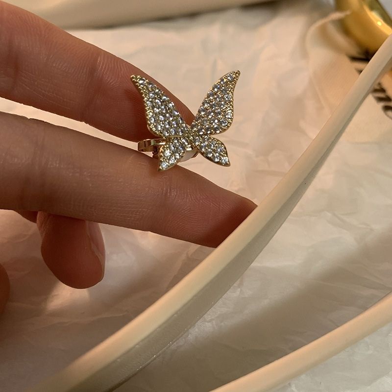 Bông tai vành cánh bướm đính đá màu vàng - Mely 1530