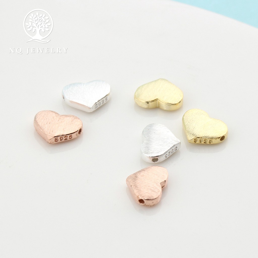 Charm bạc trái tim xỏ ngang - NQ Jewelry