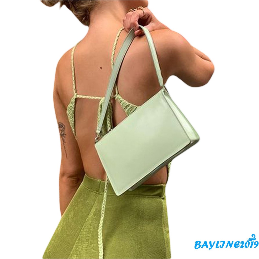 Áo lửng 2 dây tự cột chéo không tay hở lưng màu trơn cho nữ