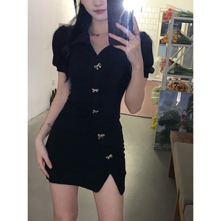 Váy ôm đen đính nơ nổi