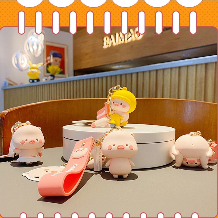 Móc khóa bé Heo đi xe máy