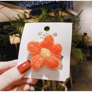 Kẹp tóc hoa cúc bằng len