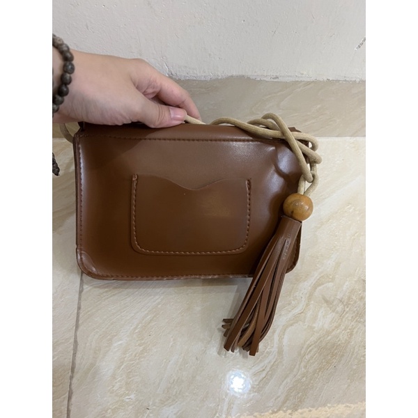 Túi si lạ màu nâu