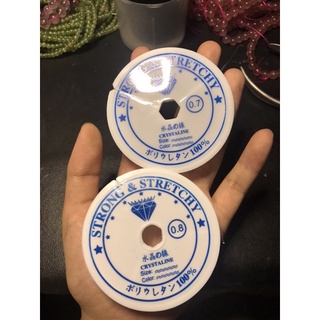 Cuộn dây cước trong có dãn xỏ vòng