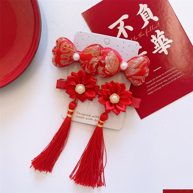 Set 4 kẹp tóc tua rua màu đỏ may mắn dành cho bé