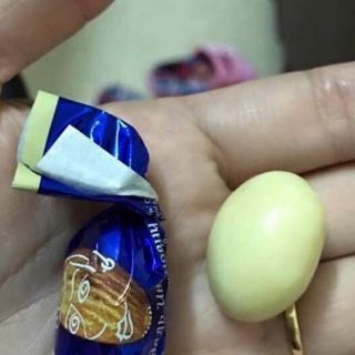 Kẹo socola trắng bọc hạnh nhân Ivan Nga