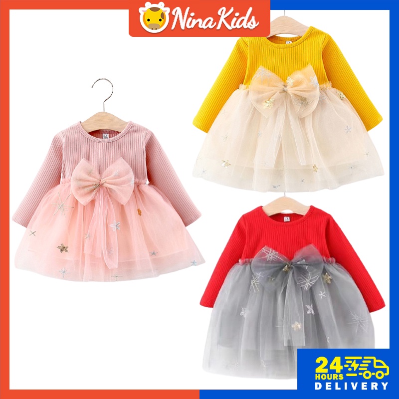 Đầm công chúa tay dài đính nơ cho bé gái 1-7 tuổi