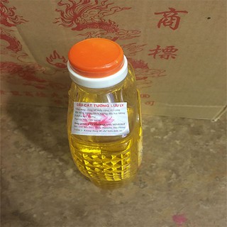 Dầu Cát Tường Lưu Ly Chai Nặng 1 Kg