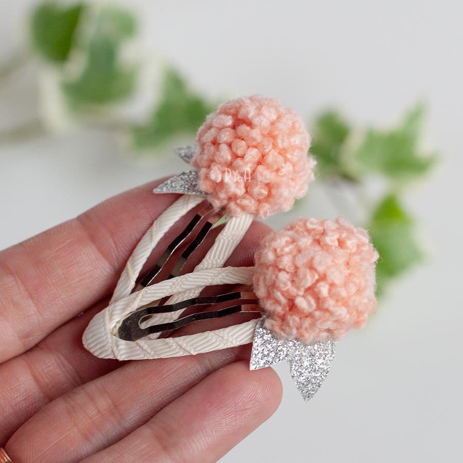 Bộ 02 kẹp tóc cho bé đính bông len RYA 11362