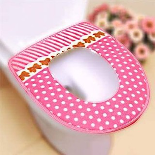 Miếng lót bồn cầu.
