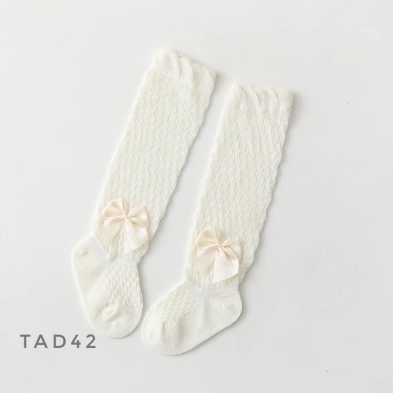 Tất lưới đùi đính nơ bắp chân cho bé TAD42