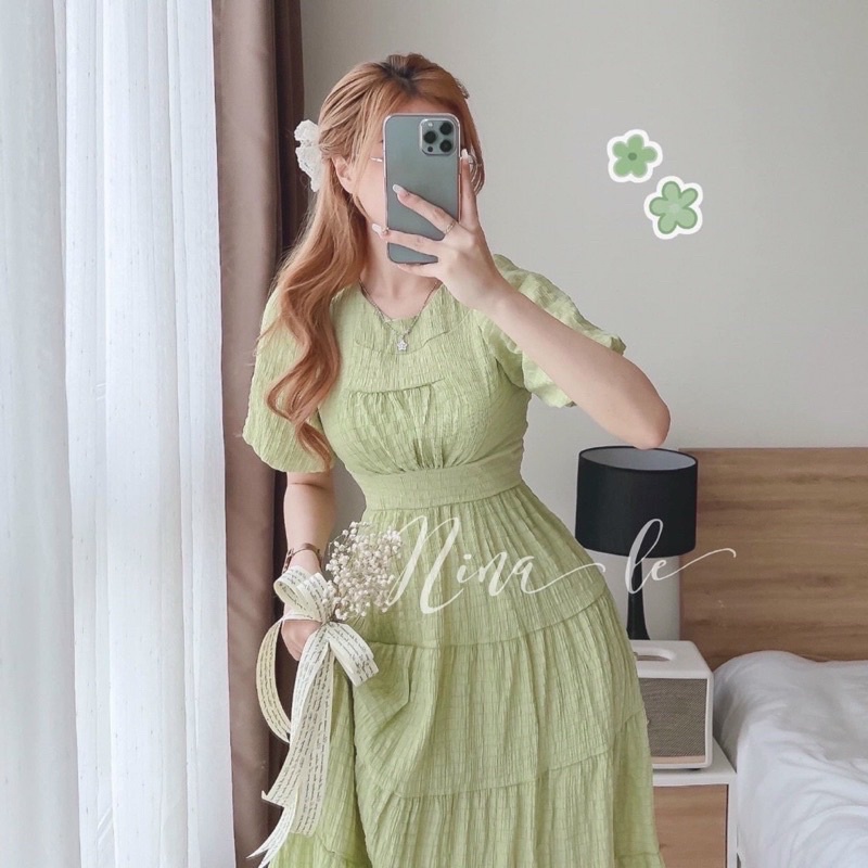 Đầm xốp nhún tay bồng phom xoè
