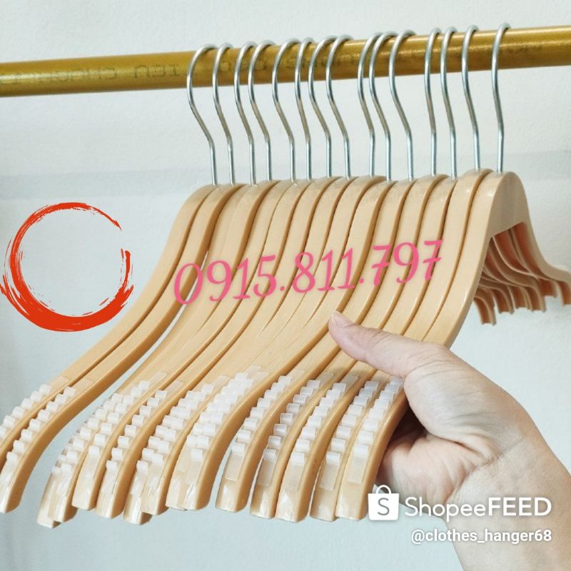 Combo 50 sản phẩm móc kẹp nhựa vàng treo quần áo,váy cho shop thời trang