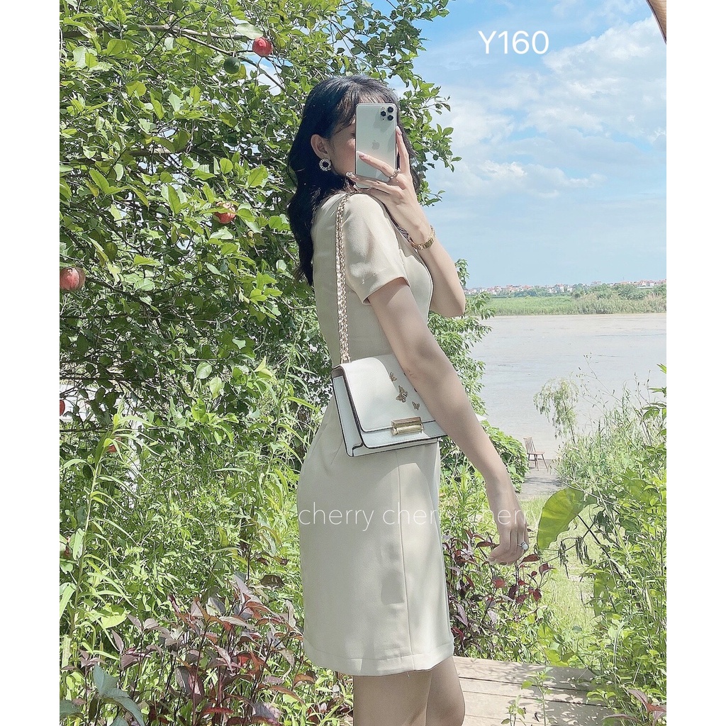 Váy văn phòng cổ V vạt eo tôn giáng tự tin