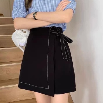 Chân váy chữ A lệch tà, chân váy ngắn kết hợp nơ thắt chéo thanh lịch