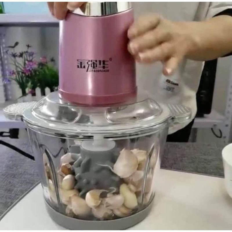 Máy xay thịt kèm dụng cụ bóc vỏ hành,tỏi