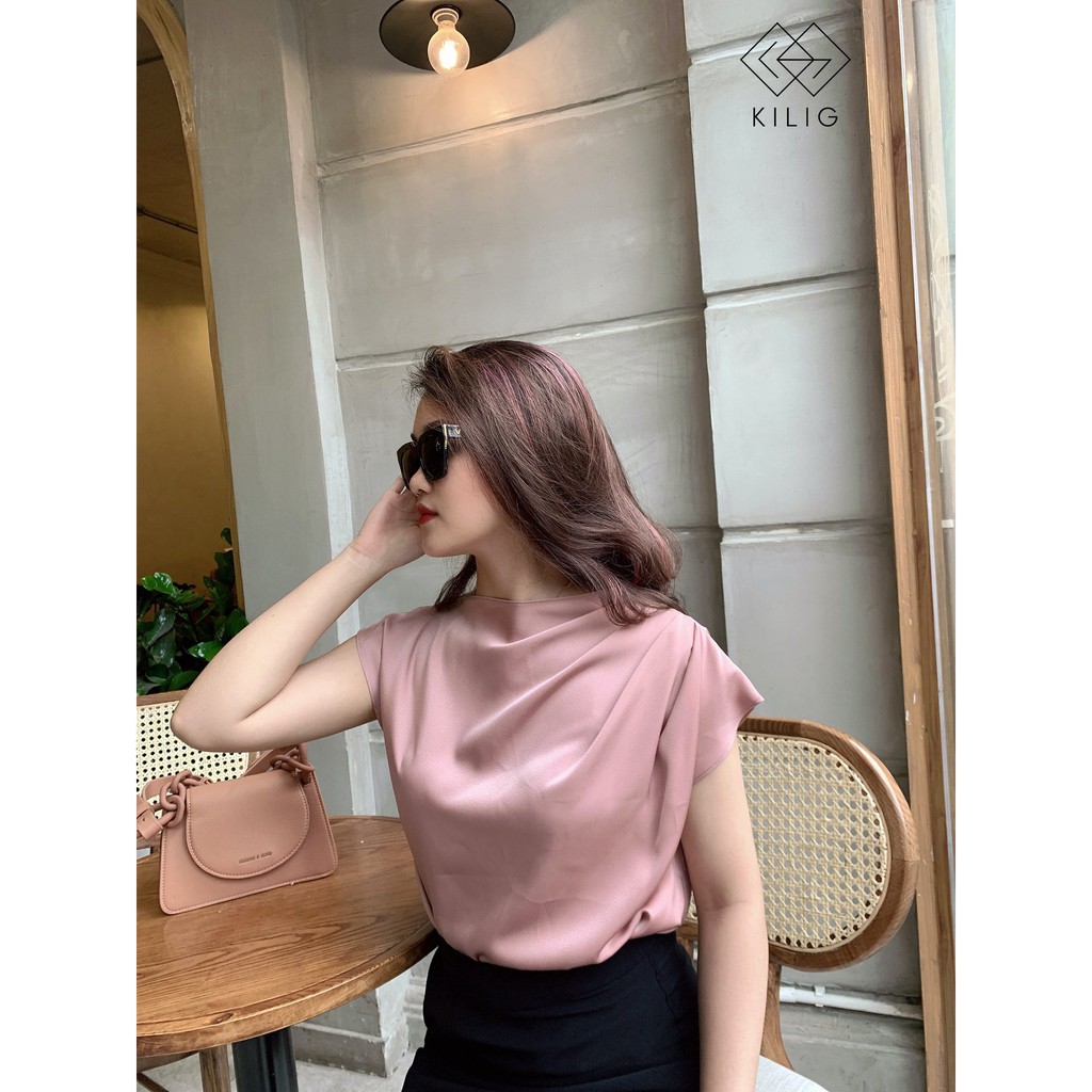Áo sơ mi lụa thiết kế lệch vai, mix & match với các kiểu dáng quần hay chân váy đều phù hợp