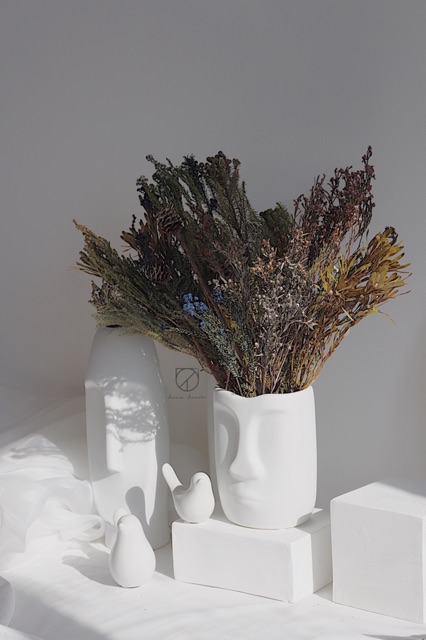 Bình hoa gốm hình nhân  Rushmore