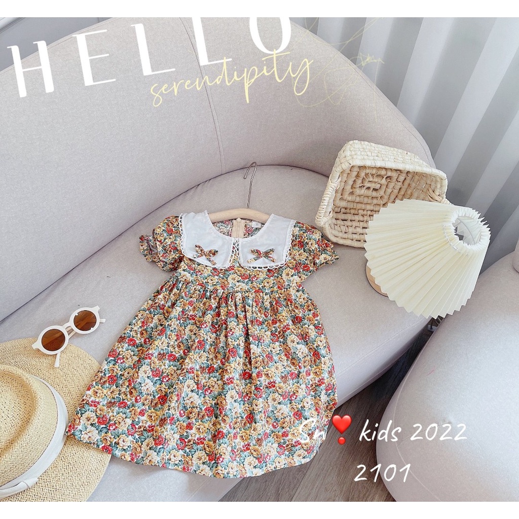 Váy babydoll hoa nhí dáng xòe cổ vuông bèo trắng 2 nơ 2 bên cổ cho bé