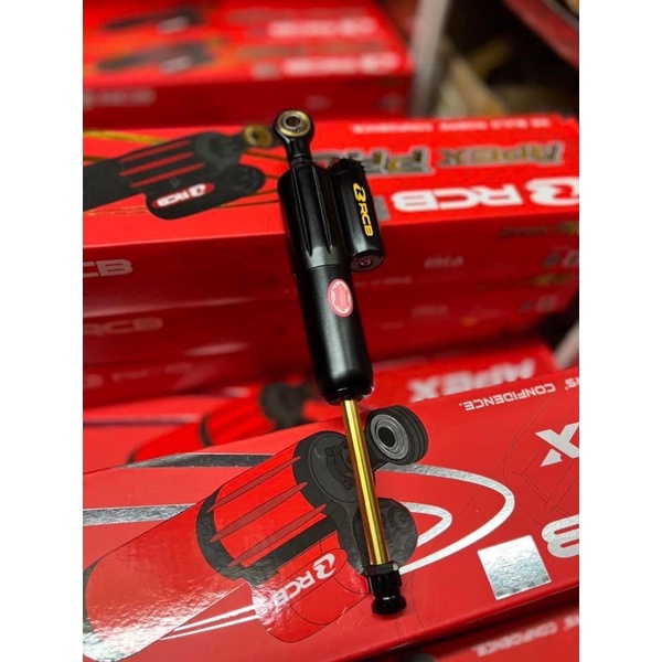 Trợ lực cổ hiệu RCB đen ty vàng gắn cho mọi dòng xe Winner/Exciter/…