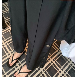 Quần ống loe xẻ tà