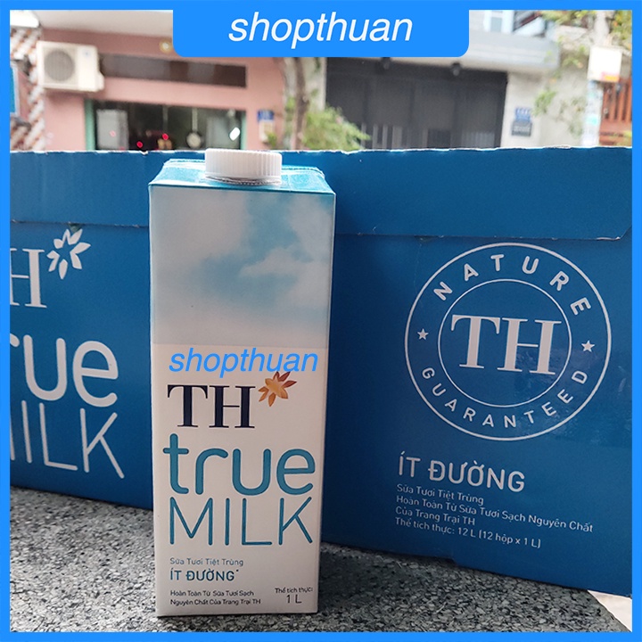 Sữa tươi tiệt trùngTH true MILK ít đường hộp giấy 1 Lít - HSD : 12/5/22