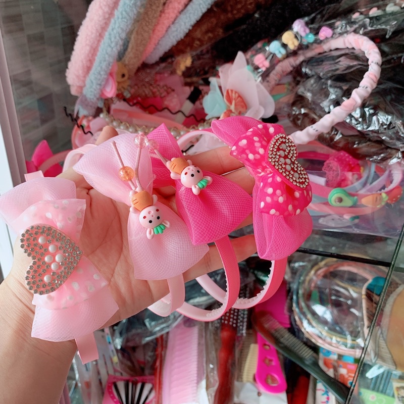 Xước tóc cho bé gắn nơ và hình siêu xinh. Bờm tóc cho bé gái. SUMO Underwear.