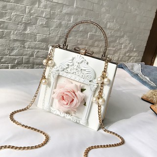 Túi xách sang chảnh đính hoa hồng