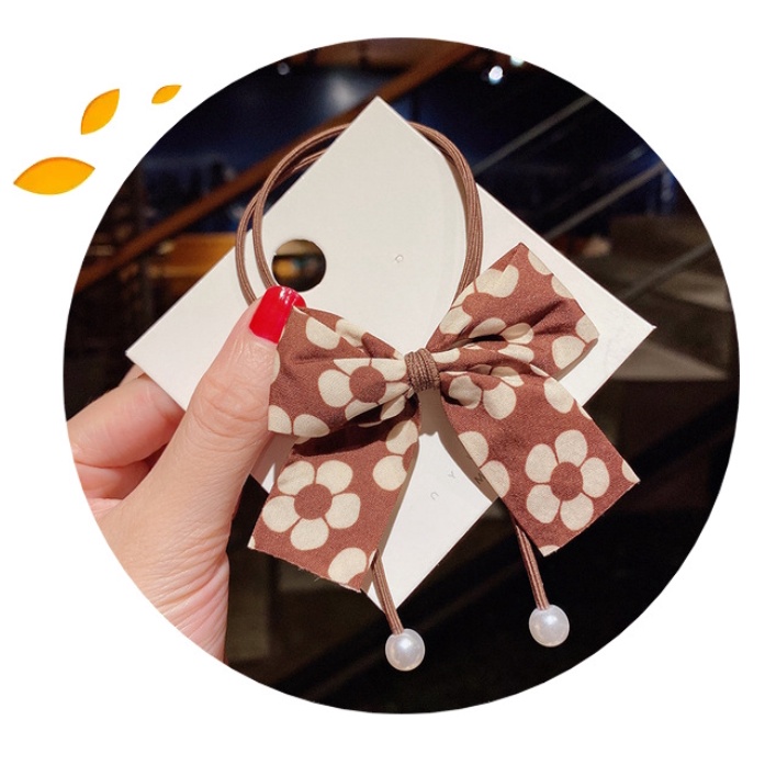 Thun cột tóc nơ bướm