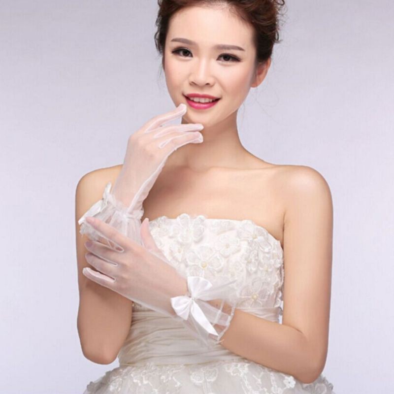 Găng tay màu trắng đính nơ quý phái dành cho nữ