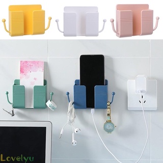 Giá đỡ điện thoại dán tường kèm móc treo sạc điện thoại tiện lợi, giúp không gian gọn gàng, bắt mắt.
