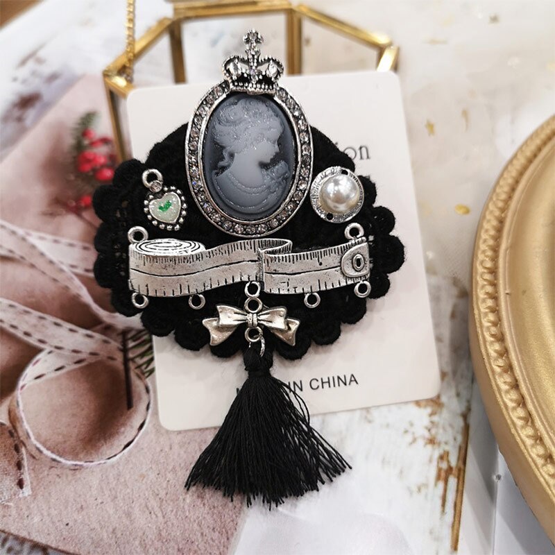 Ghim cài áo hình nơ đính ngọc trai giả thời trang cho nữ