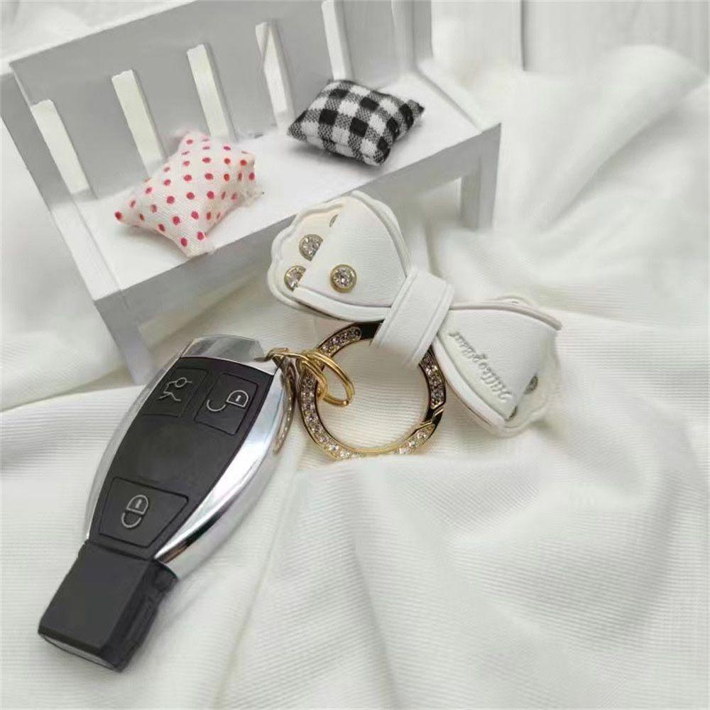 Móc Chìa Khóa Xe Hơi Bằng Da Đính Nơ Chống Thất Lạc Tiện Dụng