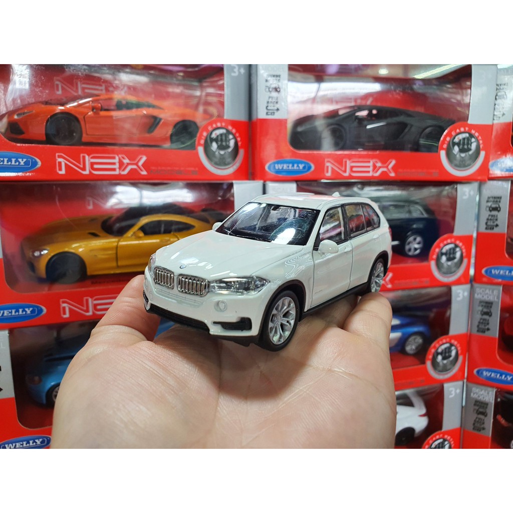 Xe  Mô Hình BMW X5 Tỉ lệ 1:34 Có Chạy Trớn Welly