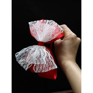 Cài tóc đỏ nơ ren to cho bé