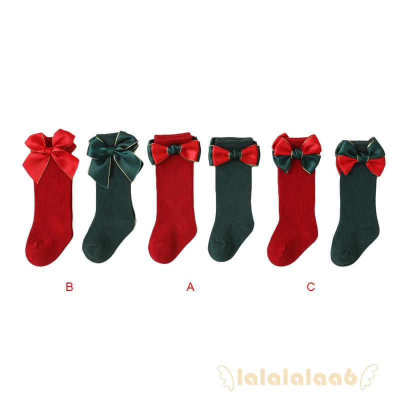 Set 2 đôi vớ dài trung bình đính nơ trang trí Giáng Sinh cho bé