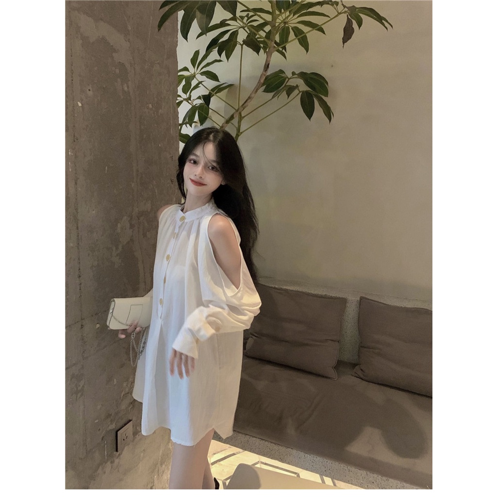 Áo sơ mi nữ trắng xẻ tay giấu quần dễ thương