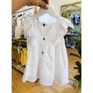 Váy Next đục lỗ bé gái