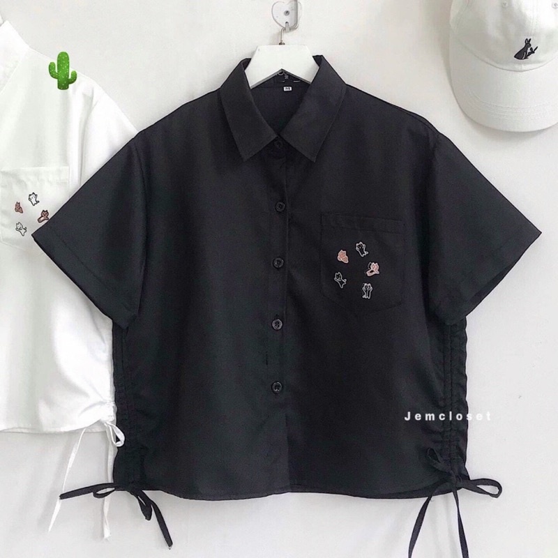 Áo sơ mi croptop rút hai bên , túi hoạ tiết thêu