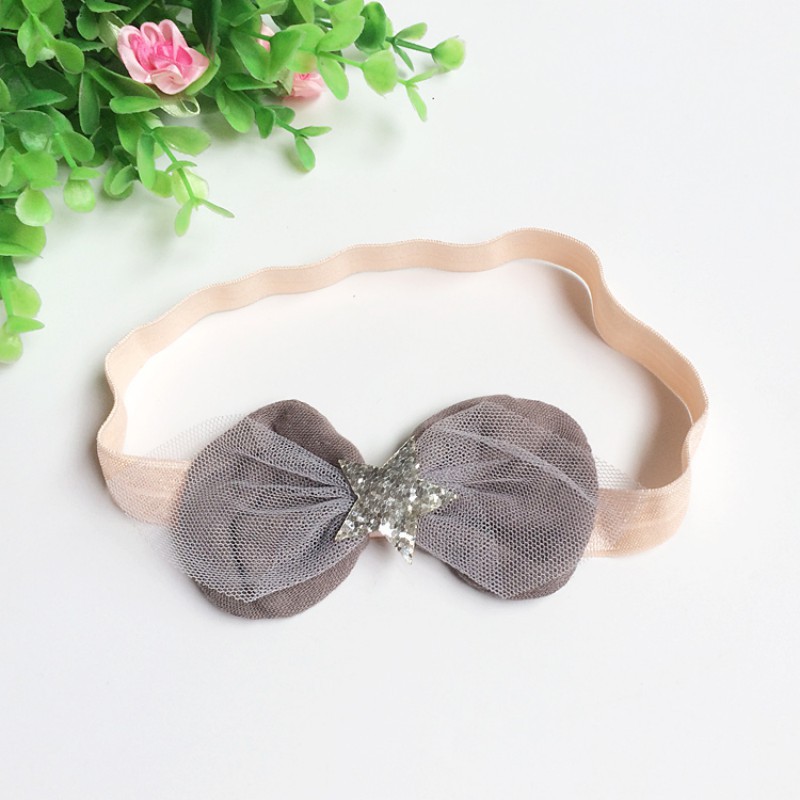 Băng đô đính nơ và sao 5 cánh cho bé