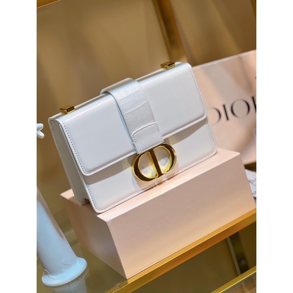 Túi trắng khoá vàng da trơn