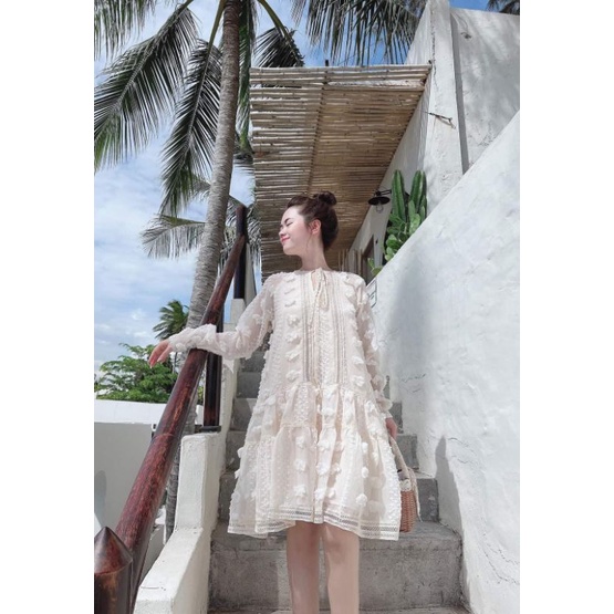 Vải tơ hoa màu trắng hoạ tiết nổi