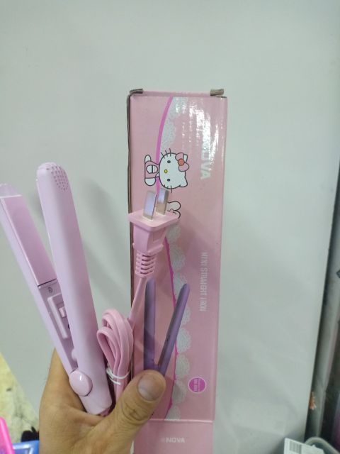 Máy Duỗi là tóc dập xù tóc mini nova cute