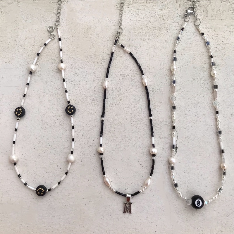 Dây Chuyền Chữ Cái Charm Tên Cườm Đen Ko Đen Gỉ