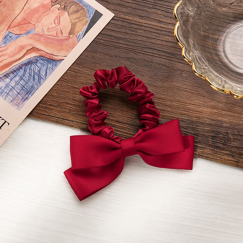 Dây buộc tóc bằng cao su đính nơ dễ thương cho nữ